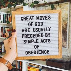 a person holding up a sign that says great moves of god are usually preceded by simple acts of obedience