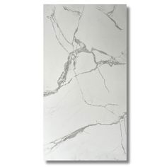 a white marble tile with grey veining