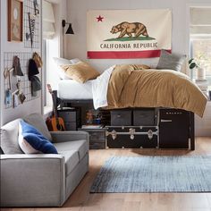 a bedroom with a california flag hanging above the bed