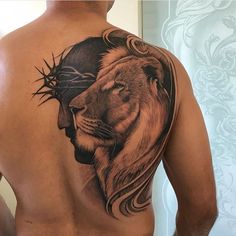 a man with a lion tattoo on his back