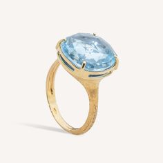 JAIPUR COLOR 18K Yellow Gold and Blue Topaz Cocktail Ring Topaz Cocktail Ring, Sky Blue Topaz Ring, Gold Skies, Marco Bicego, Blue Topaz Gemstone, Gold And Blue, Sky Blue Topaz, 18k Yellow Gold Ring, Tourmaline Gemstone