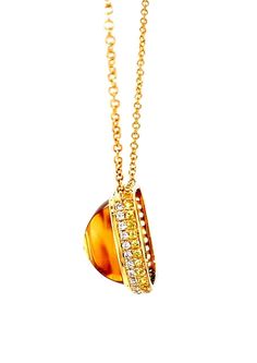 This beautiful necklace can be worn with anything, given its "gold on gold" colorway. It features a gorgeous 16.79 carat citrine square "sugarloaf" cabochon, whose rounded "sides" give the gemstone beautiful added dimension. The citrine is set in an exquisite, handmade 18k yellow bezel and is framed by a row of brilliant white diamonds. A second frame of pave set sparkling yellow sapphires echo the citrine's golden color and make this pendant stunning from all angles! The pendant measures 3/4" i Ruby Sapphire, Ring Pendant Necklace, Sapphire Necklace, Yellow Sapphire, Beautiful Necklace, Golden Color, White Diamonds, Shades Of Purple, Smoky Quartz