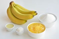 bananas and other ingredients on a white surface