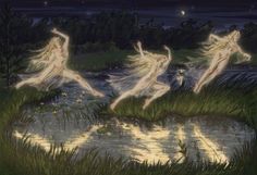 three women are dancing in the water at night