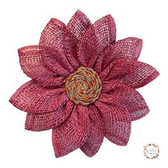 a large pink flower made out of mesh