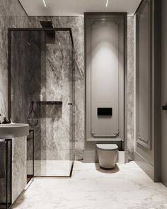 a modern bathroom with marble walls and flooring