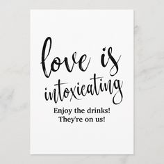 a card that says love is intoxicating enjoy the drinks they're on us