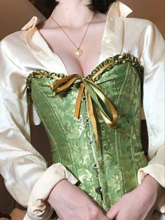 Green Corset Aesthetic, Corset With Shirt Underneath, Corset With White Button Up, Corset And Shirt Outfit, Corset On Top Of Shirt, Corset Aesthetic Outfit, Green Satin Shirt Outfit