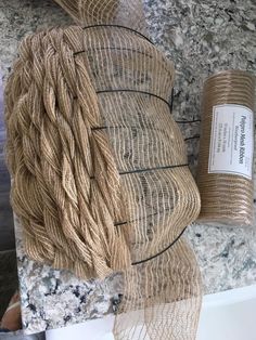 a roll of twine sitting on top of a counter