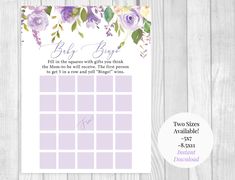 the purple floral baby shower game is shown on a wooden table with white wood planks