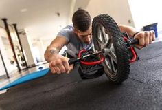 a man is working on an exercise bike