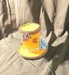 Hand made mini yellow bee themed top hat with flowers. roughly 2 1/2 inches wide and 3 inches tall. Whimsical Adjustable Mini Hat For Costumes, Spring Yellow Adjustable Mini Hats, Handmade Yellow Whimsical Hat, Yellow Wide-brim Mini Hat For Party, Yellow Bee, Costume Hats, Bee Theme, Top Hat, Costume Accessories