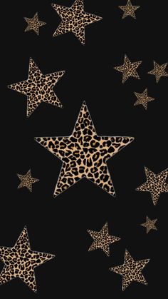 an animal print star pattern on black background