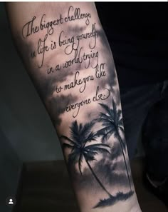 a man's arm with a palm tree and quote tattooed on the left forearm