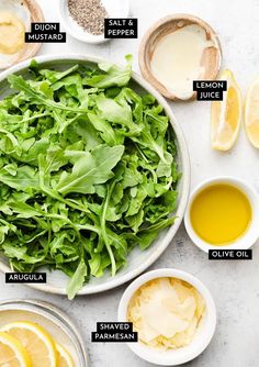 the ingredients needed to make a salad including lemons, olive oil and mayonnaise