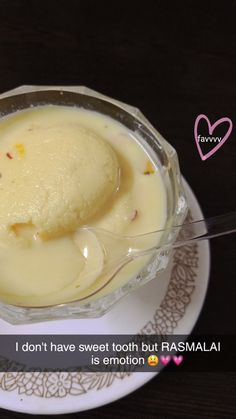 a bowl filled with ice cream on top of a white plate