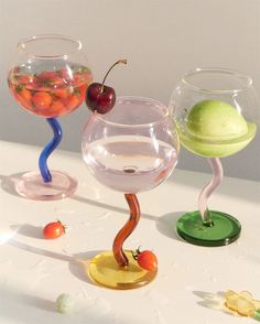 Bring a bubbly style to your wine glass with this contemporary twist-handled piece. Crafted from borosilicate glass in bright colors, it’s sure to be the talk of the table. • Borosilicate Glass • 300ml • Base 2.5" x Caliber 3.5" x Height 6.2" (6.5 x 8.77 x 16cm ) Burgundy Wine Glasses, Colored Wine Glasses, Colored Bubbles, Dessert Glasses, Wine Collection, Glassware Collection, Wine Cups, Pink Glass, Glass Cup