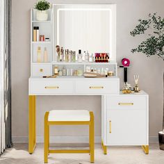 a white vanity with yellow legs and stools in front of a large mirror on the wall