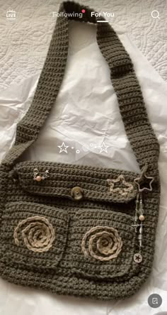 a crocheted purse with two circles on it