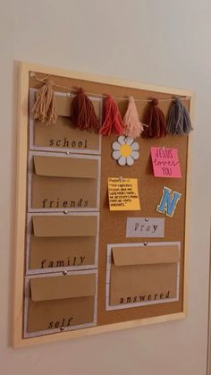 a bulletin board with several different items attached to it