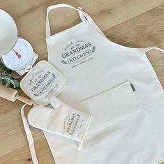 an apron with the words grandma's kitchen written on it next to some ingredients