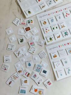 several cards and magnets laid out on a table