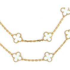 Marvel at the fusion of historic craftsmanship and modern elegance in the Van Cleef & Arpels Alhambra 18K Yellow Gold 20 Motif Circa 1985 White Coral Necklace. Transport yourself to a world of timeless beauty with this vintage piece, showcasing Van Cleef & Arpels' iconic Alhambra design. Crafted in exquisite 18K yellow gold, this necklace features 20 clover-shaped motifs adorned with creased textures and delicate gold bead trimmings.The centerpiece of this stunning necklace is the rare and elegant white coral, adding a touch of natural allure and sophistication to your ensemble. Each motif is a symbol of luck and charm, embodying the essence of Van Cleef & Arpels' legendary craftsmanship and artistic flair.This necklace is not just a piece of jewelry; it's a statement of style and heritage White Designer Jewelry With 17 Jewels, Designer White Jewelry With 17 Jewels, White Luxury Jewelry With Polished Finish, Luxury White Jewelry With Polished Finish, Exquisite 14k Gold White Necklace, Luxury White Necklaces With Polished Finish, Luxury White Hallmarked Jewelry, Luxury White Gold Plated Necklaces, Luxury White Necklaces