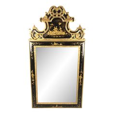 an ornate mirror is shown against a white background