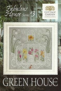 the front cover of a cross stitch pattern for a house with flowers and plants on it