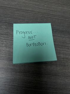 a sticky note with the words process not perfection written on it