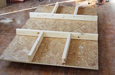 the unfinished pieces of plywood are ready to be installed on the floor in the house