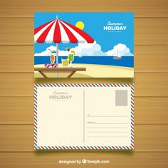 a postcard with an umbrella and beach scene on the wooden background, in flat lay style