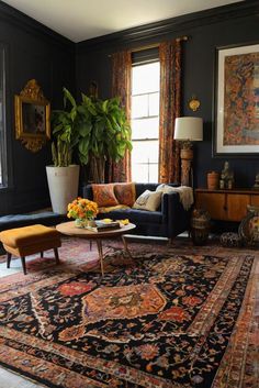 a living room filled with furniture and a large rug