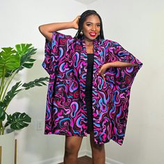 Made with African print cotton.  Has two side pockets and comes with a belt. The styling possibilities are endless.  Wear it with or without the belt. Wear it  jeans, leggings, shorts or a dress. This Oversized Kimono is ONE SIZE FIT ALL Kimono. Fits up to size US 24. CARE INSTRUCTIONS  For better results, handwash your African print clothing in cold water. Use a mild detergentor soap. theow in a tablespoon of salt in your wash water.  the chlorine content in the salt will help seal the colors i African Kimono, Oversized Kimono, Sleeveless Kimono, African Print Clothing, Leggings Shorts, Jeans Leggings, Loose Fitting Tops, African Clothing, Clothing For Women