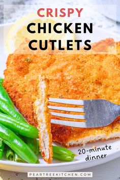 crispy chicken cutlets on a plate with green beans