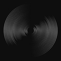 an abstract black and white photo with circles in the center, on a dark background