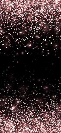 pink and black glitter background with lots of small stars on the bottom right side of the image