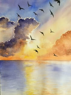 a watercolor painting of birds flying over the ocean at sunset with clouds in the sky