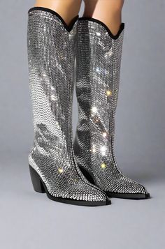 These Rhinestone Boots from Primadons and Donnas are a must-have for any fashionista. Crafted from high-quality materials, these boots are made to order and will take around 2-4 weeks to arrive. If you need them sooner, you can add a rush charge to get them in around 1 week. These boots come in a classic black and silver color with a chunky heel. If you would like this style, please make sure to include it in your order purchase notes. These Rhinestone Boots are sure to make a statement and will Rhinestone Fringe Boots For Night Out With Round Toe, Fall Rhinestone Fringe Boots For Night Out, Fall Night Out Boots With Rhinestone Fringe, Bling Boots For Evening And Fall, Bedazzled Round Toe Evening Boots, Evening Boots With Bling For Fall, Formal Rhinestone Boots For Winter, Glamorous Boots With Rhinestone Fringe And Round Toe, Luxury Rhinestone Boots For Night Out