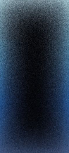 a blurry image of blue and black colors