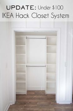 an empty walk in closet with white shelving and wood flooring on the walls