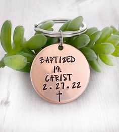 a keychain with the words baptist in christ 2 21 - 22 on it