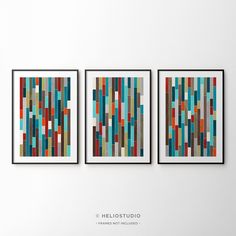 three framed art pieces on a wall with the words hellolostudio above them