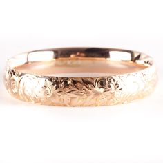 14k Rose Gold Etched Style Hollow Hinged Bangle Bracelet 19.4g 7.25" LengthMetal Information: 14k Rose GoldTotal Weight: 19.4gWidth: 12.6mmLength: 7.25"Estimated Retail Price: $3150.00OUR PRICE: $2520.0046095 Formal Rose Gold Hallmarked Bracelet, Formal Rose Gold 14k Bracelet, Hallmarked Rose Gold Bangle For Formal Occasions, Rose Gold Bangle Bracelet For Wedding, Engraved Rose Gold Bracelets For Wedding, Formal Pink Gold Bracelet, Hallmarked Rose Gold Bracelets, Rose Gold Engraved Bangle For Wedding, Engraved Rose Gold Bangle Bracelet