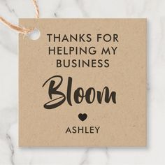 a sign that says thanks for helping my business bloom ashley on the side of a marble surface