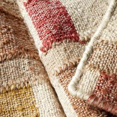 a close up view of a multicolored rug