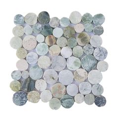 a white and grey marble mosaic tile with circles on the bottom, in various colors