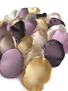 purple and gold scallopeds are arranged on a white surface with text that reads,