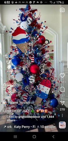 a decorated christmas tree with red, white and blue decorations