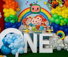 a birthday party with balloons and decorations